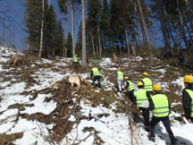 Inspection of harvest land still covered in snow 